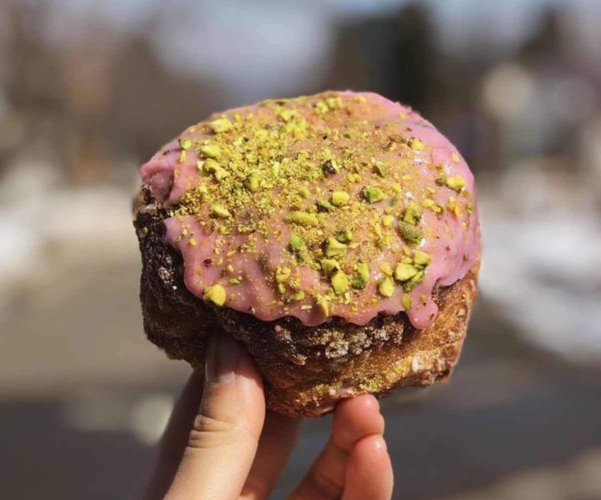 Rasberry pistachio doughnut at parlor doughnuts in denver CO