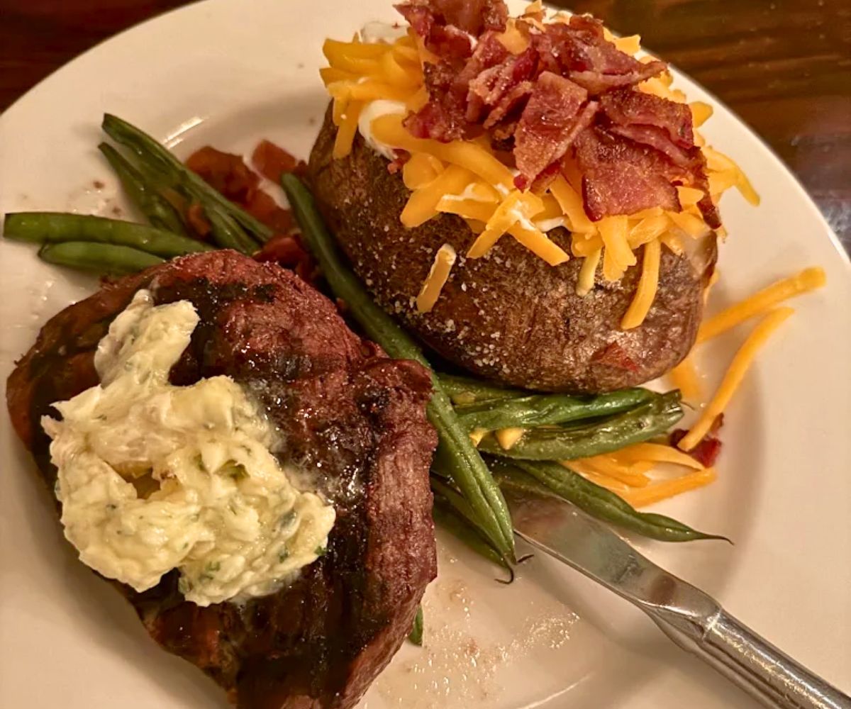 steak with baked potato at The Miller House in Owensboro, Kentucky