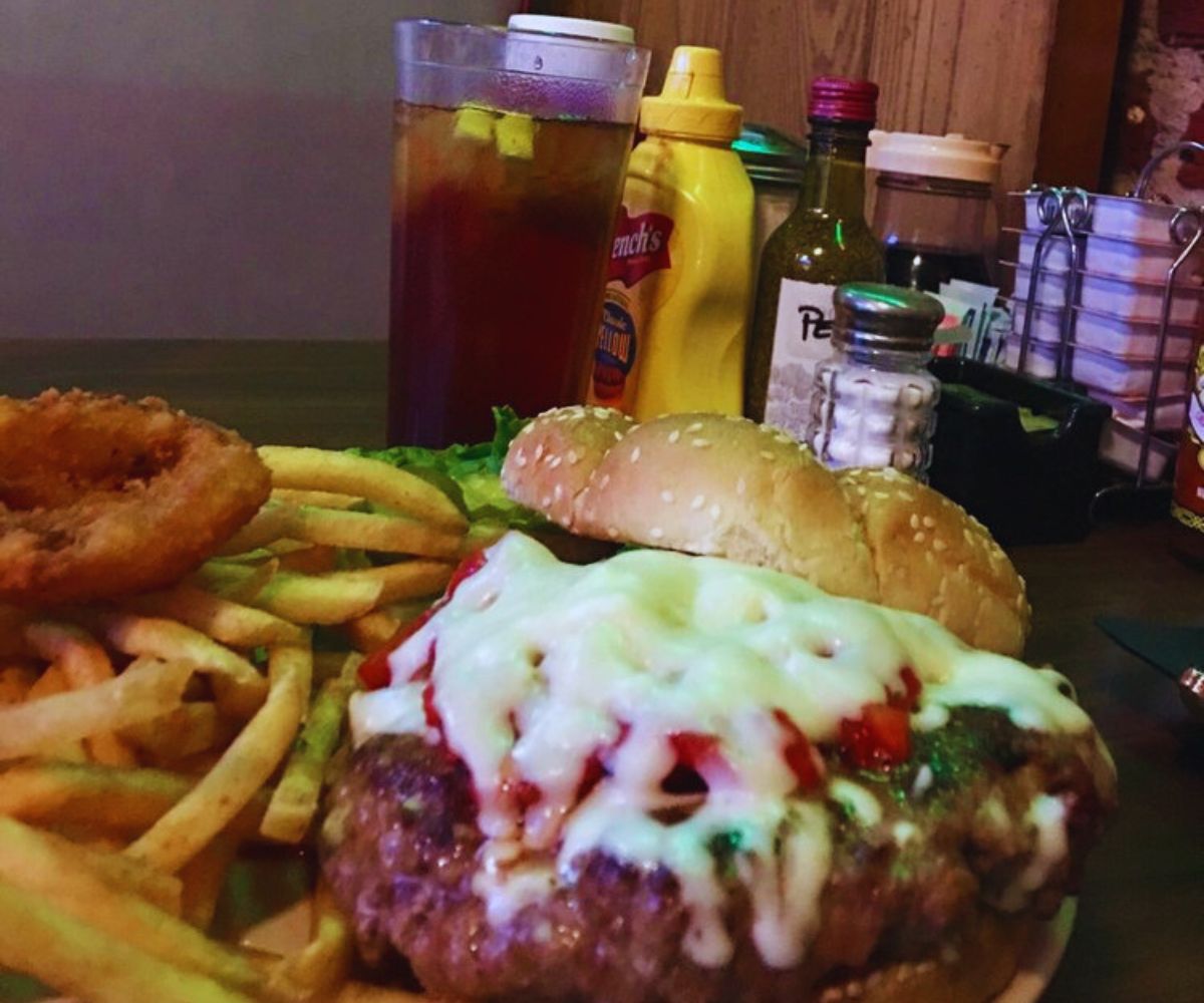 Louie M's Burger Lust The Trish Burger with Fries and Onion Rings