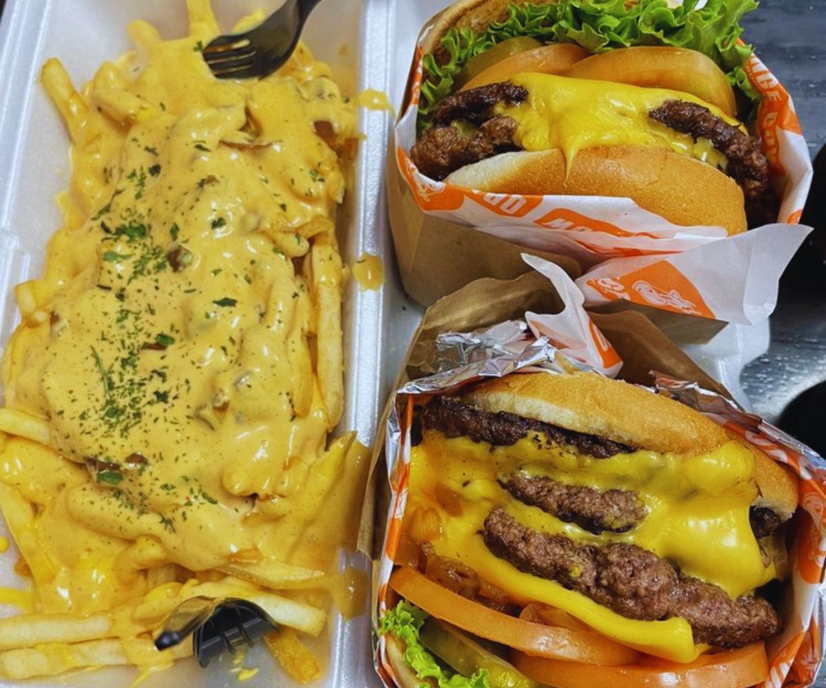 Orange Cow Burgers Triple Cow & Double Cow with Family Size Loaded Fries