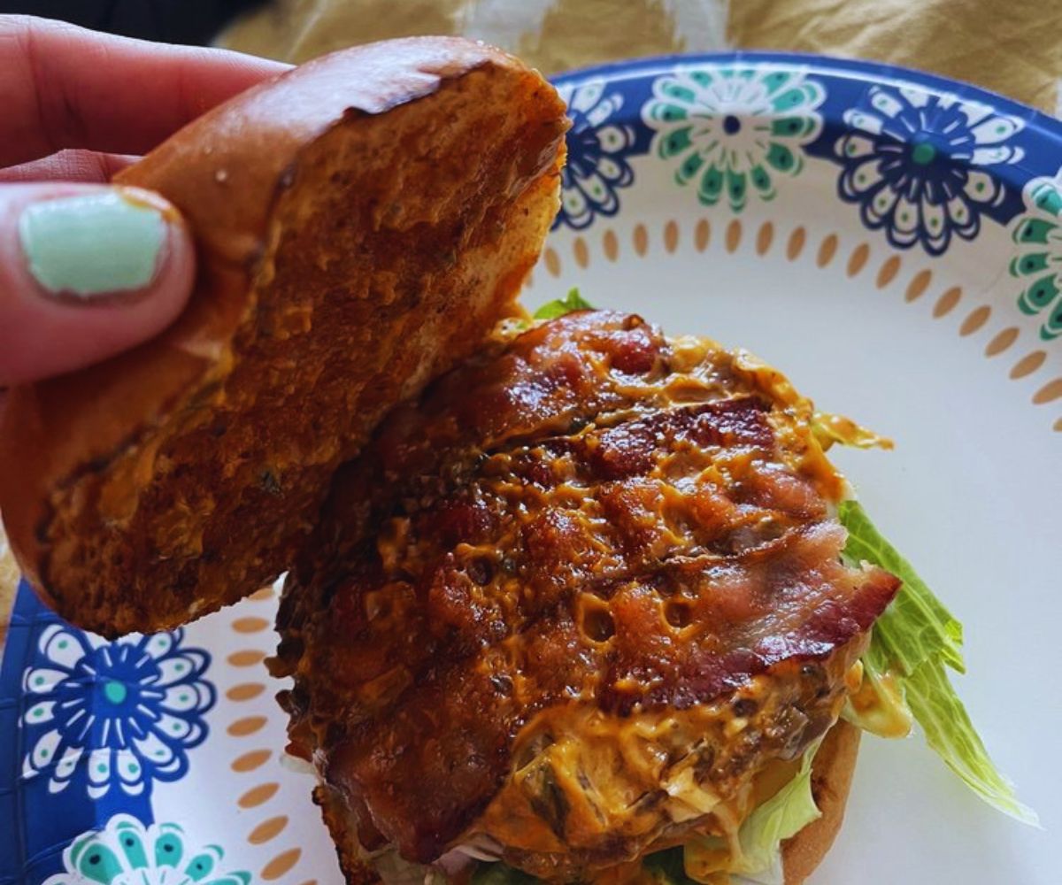 Crave Burger Cafe - Alaskan Goddess Salmon Burger with added Bacon