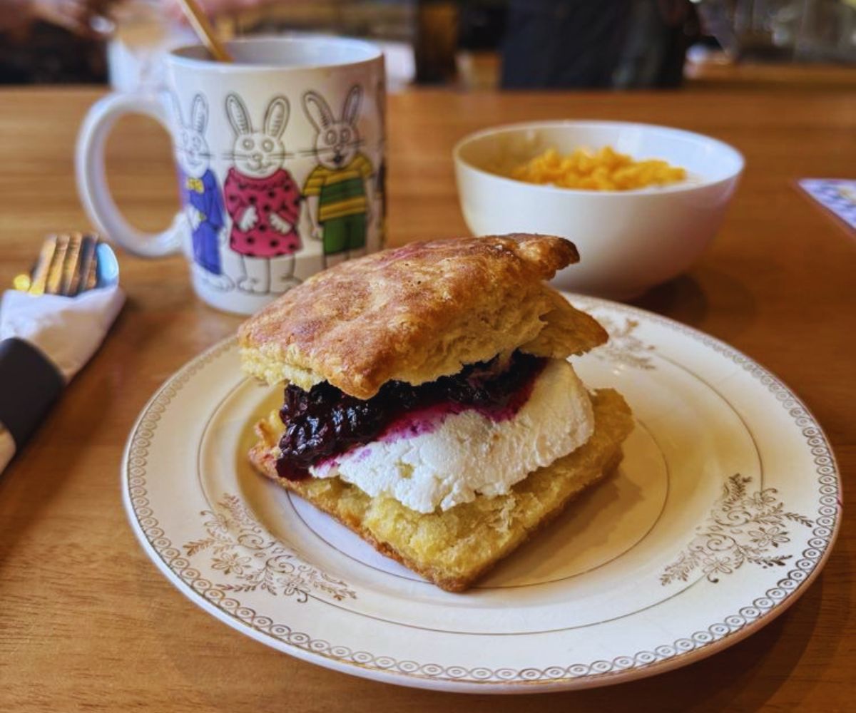 Town Biscuits Biscuit with Blueberry & Goat Cheese, Grits, and Coffee