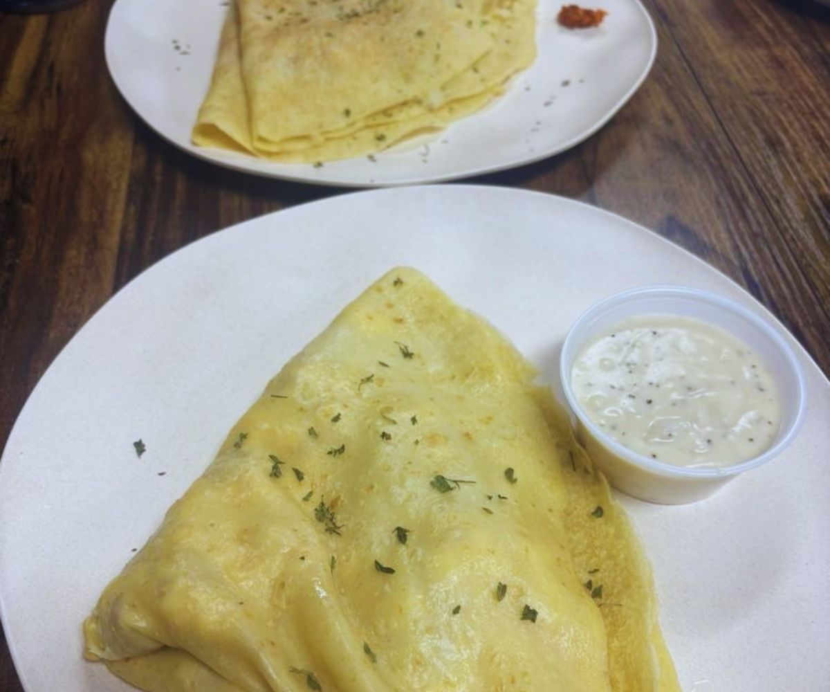 Crepeology Cafe - Bacon & Egg Crepe, Chorizo & Egg Crepe served with Gravy