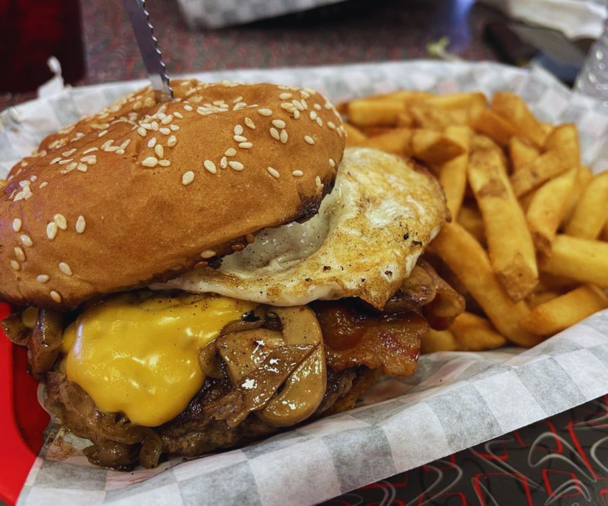 Happy's Hamburgers - The Ultimate Burger with Fries Close-up