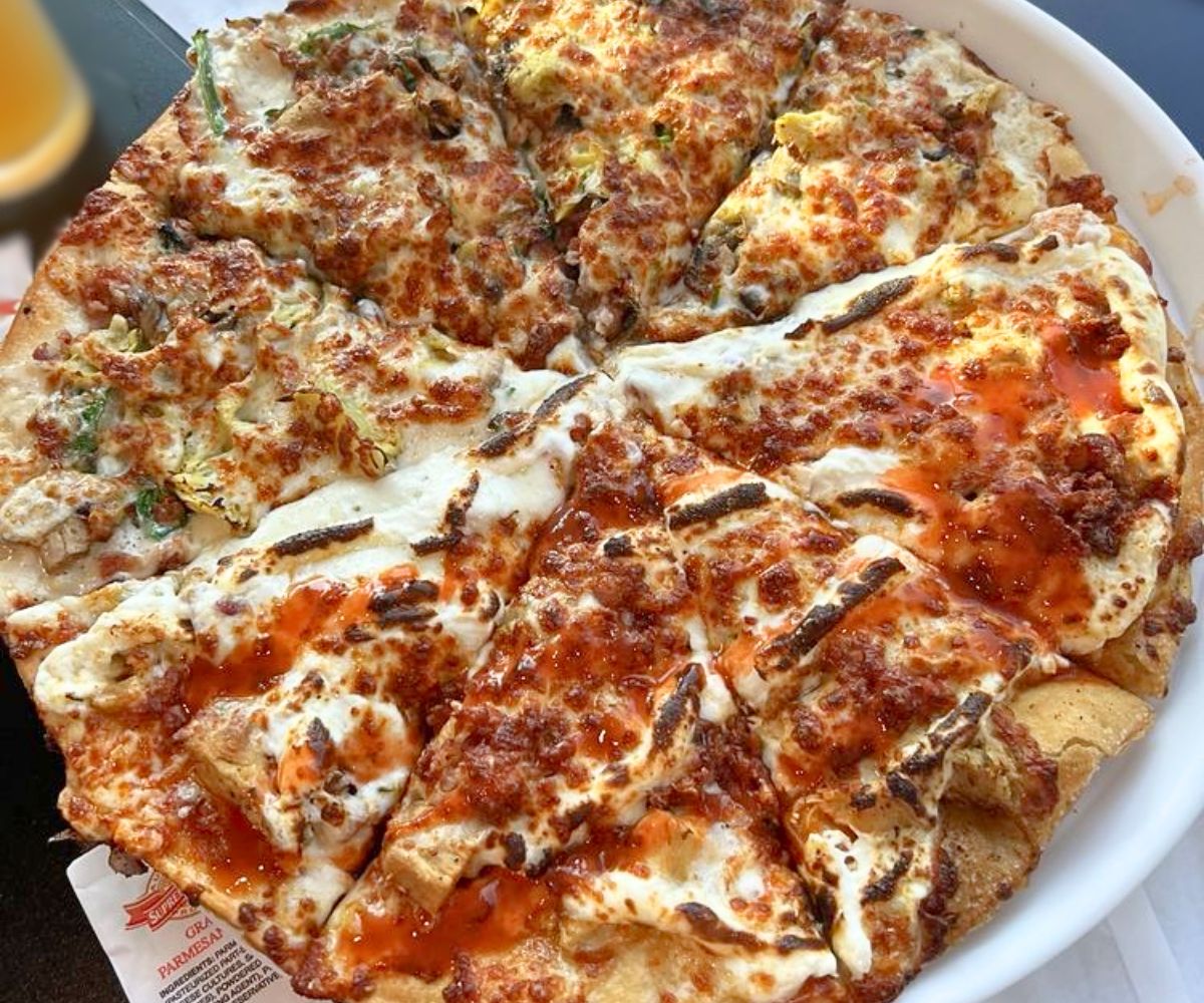 Half Alfredo Deluxe & Half Buffalo Chicken at Caniglia's a Mano in Papillion, Nebraska