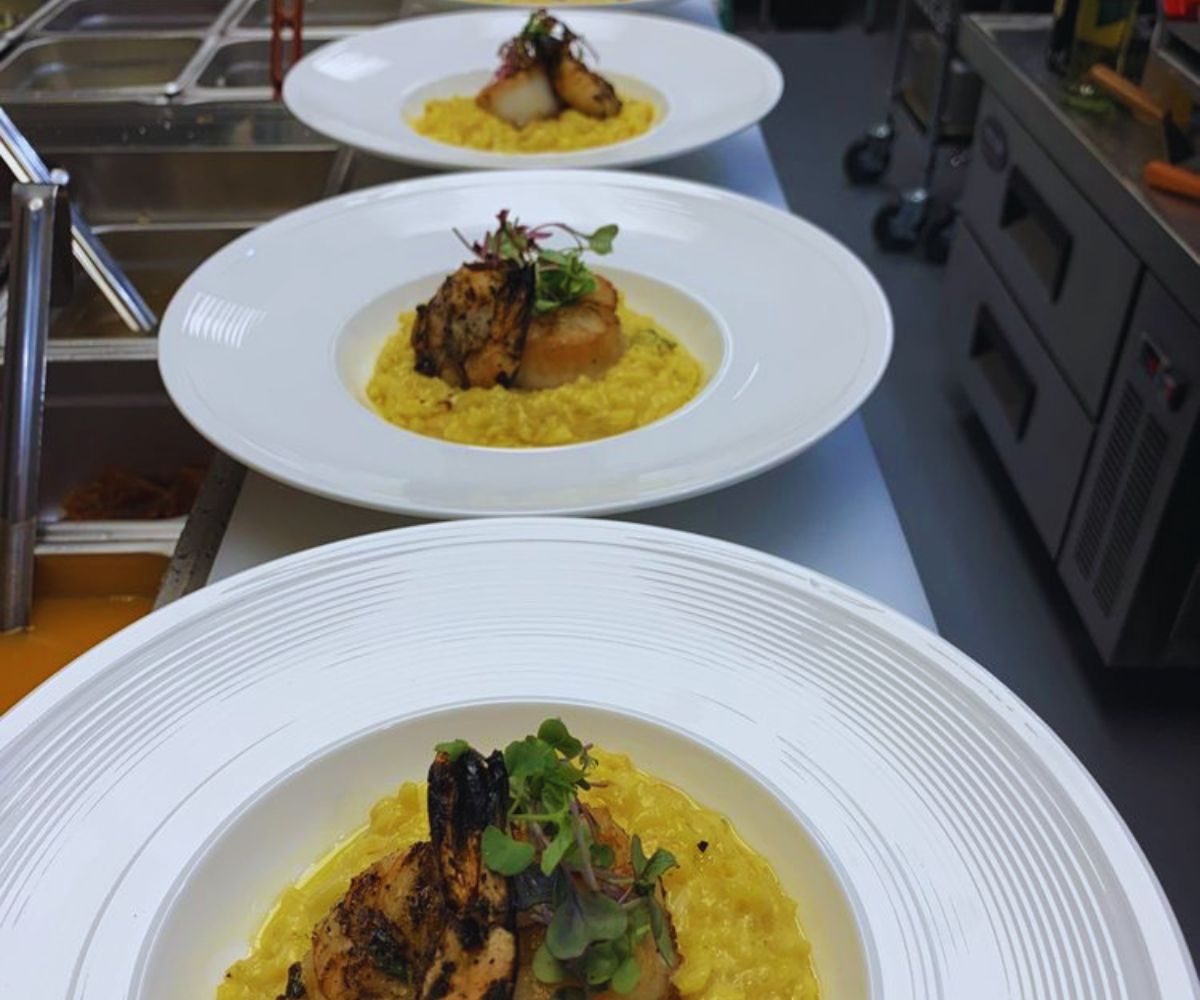 Portofino - Row of Seafood Risotto in the Kitchen