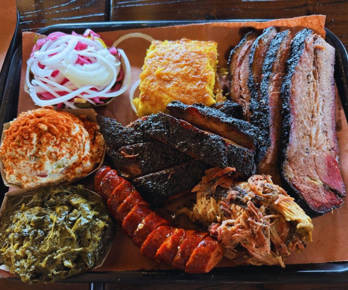 Lewis Barbecue - Potato Salad, Collard Greens, Green Chilies, Corn Pudding, Ribs, Gut Buster Sausage, Pulled Pork and Brisket