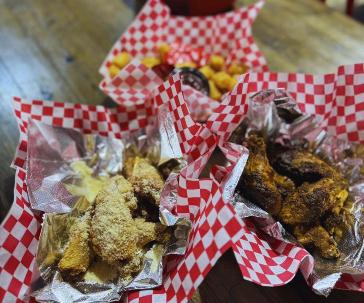 Cluck Chicken - Garlic Parm (left), Jerk (right), & Tots