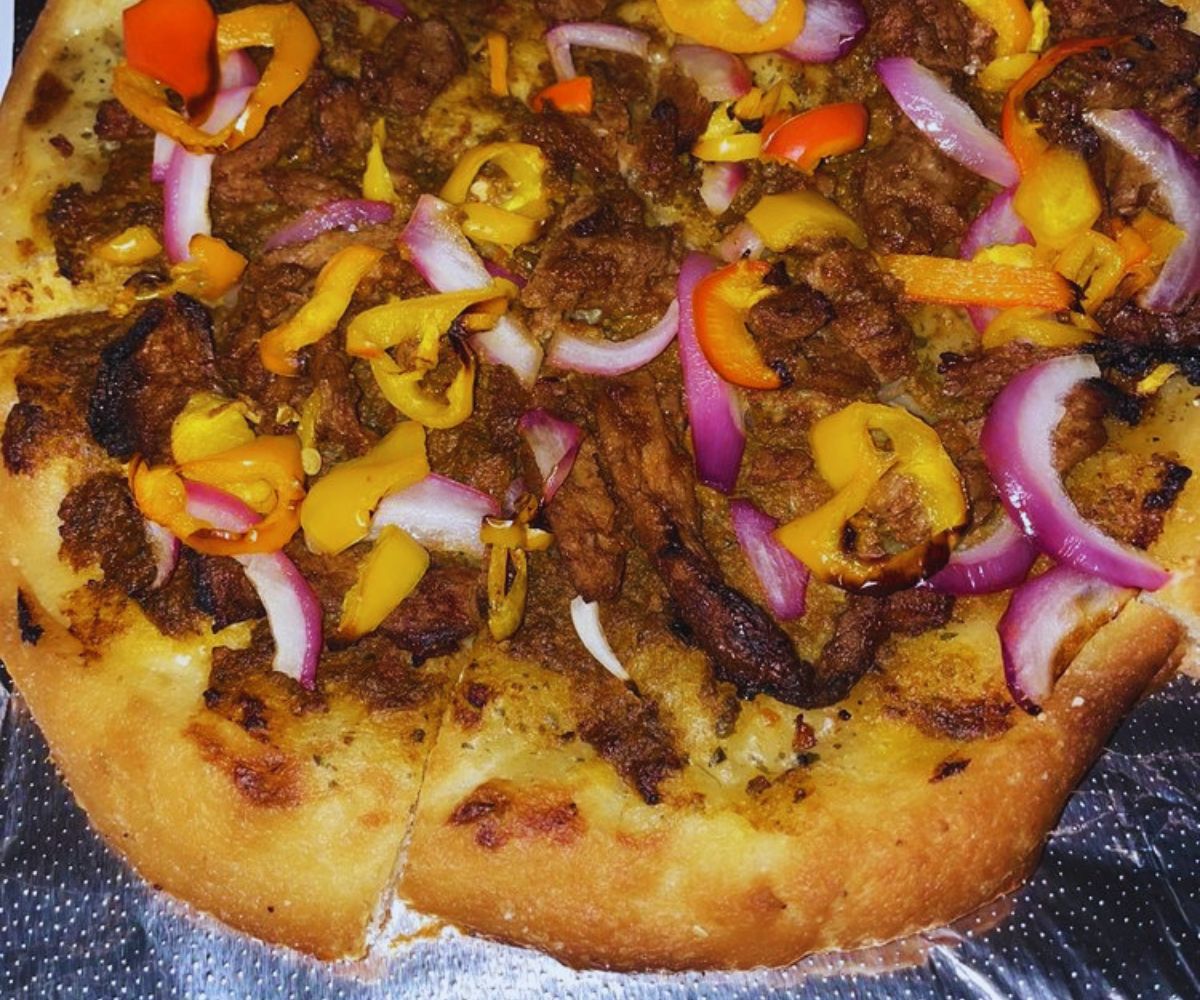 Secret Pizza Society - Reddy Kilowatt Pizza