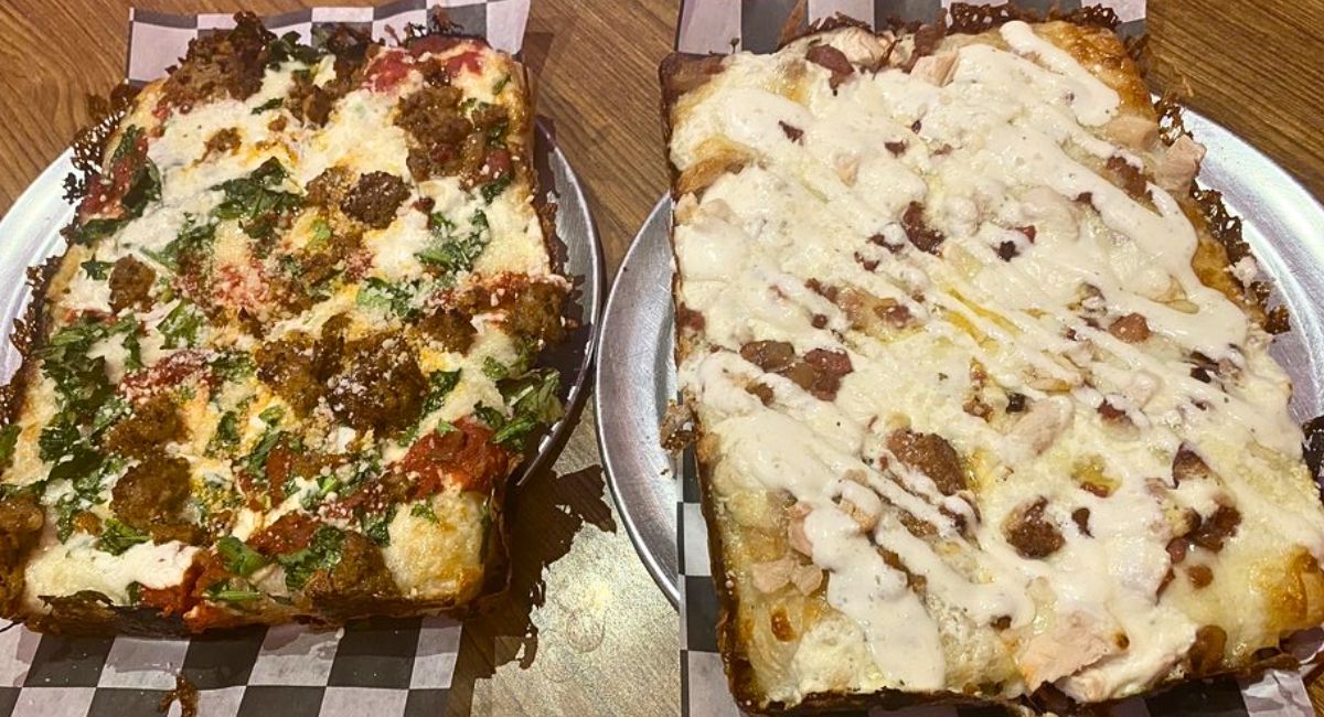sausage rabe (left) and Chicken bacon ranch at Pizza Wizard in Rochester, NY