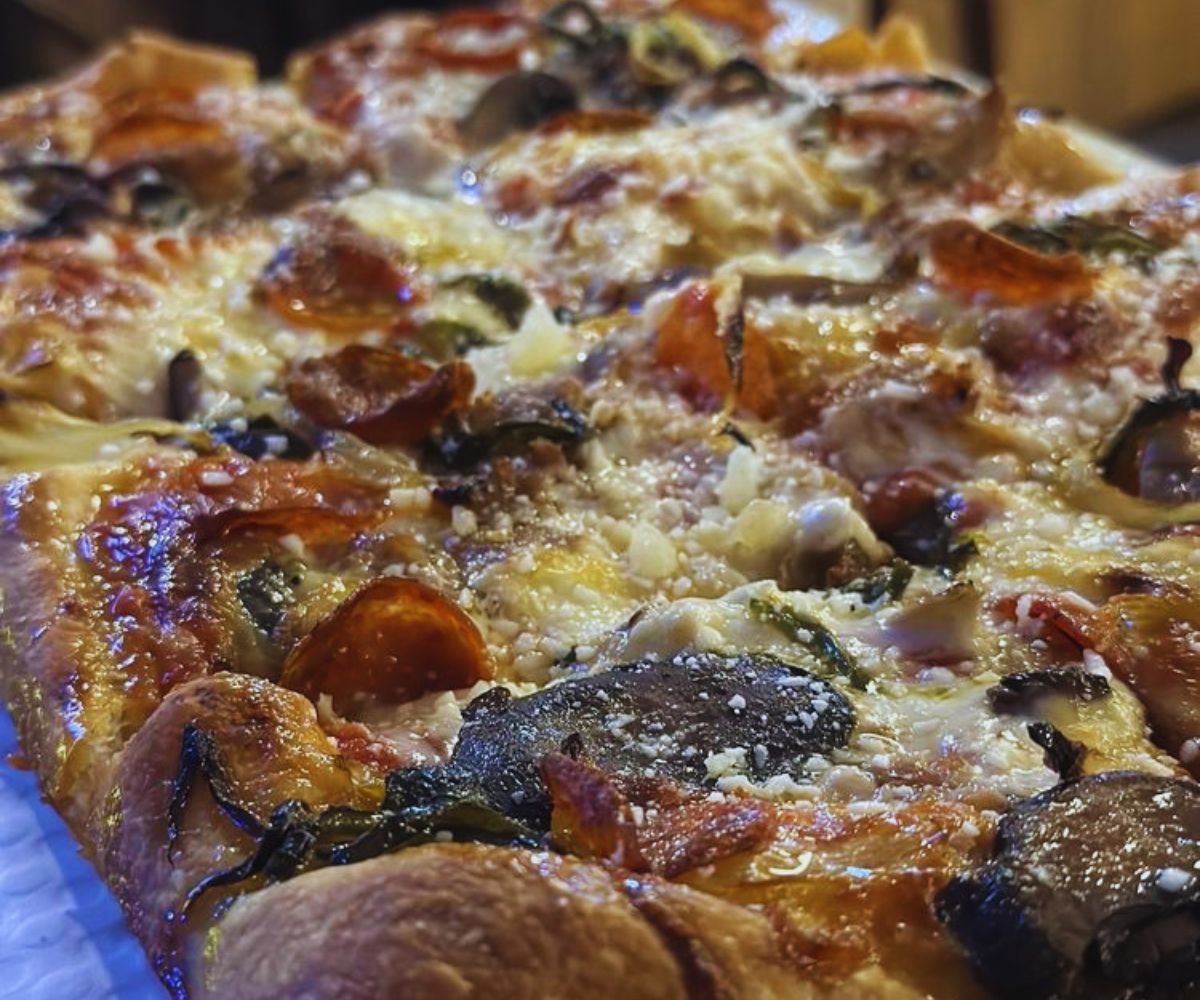 Mario's - Supreme Pizza Closeup