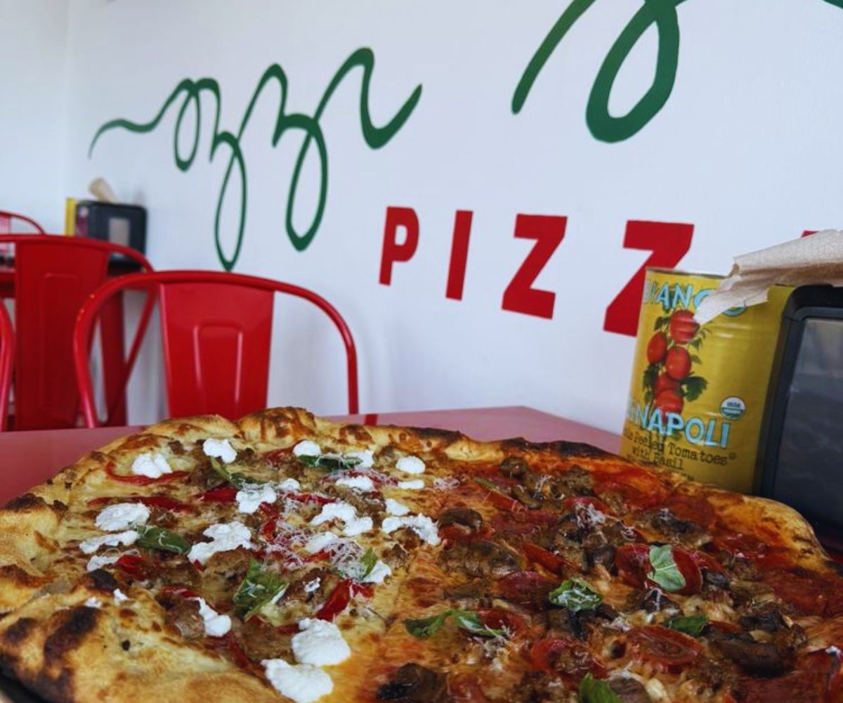 Ozzi’s Pizza - Half Sausage with Peppers Half Meat Lovers and added Mushrooms