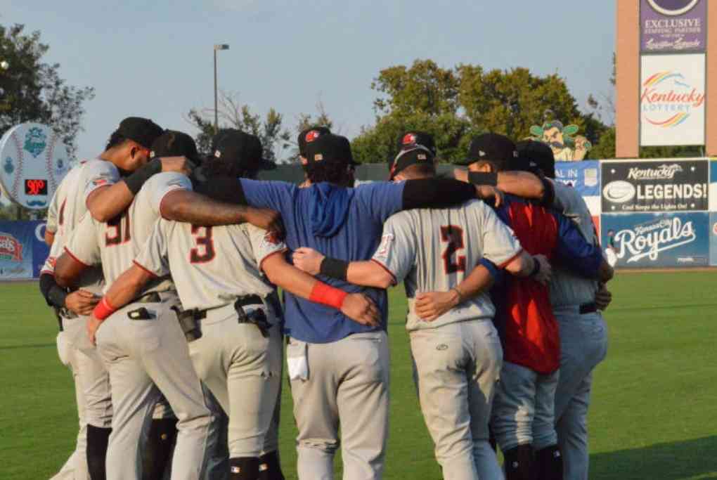 Hickory Crawdads huddling before a Championship game