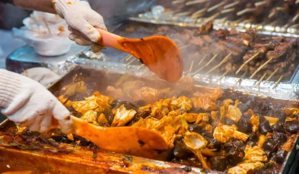 korean street food vendor preparing food