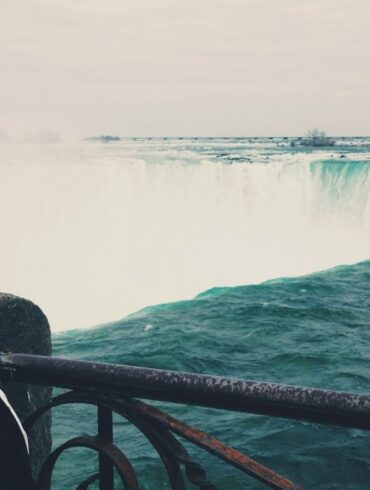 woman watching niagara falls