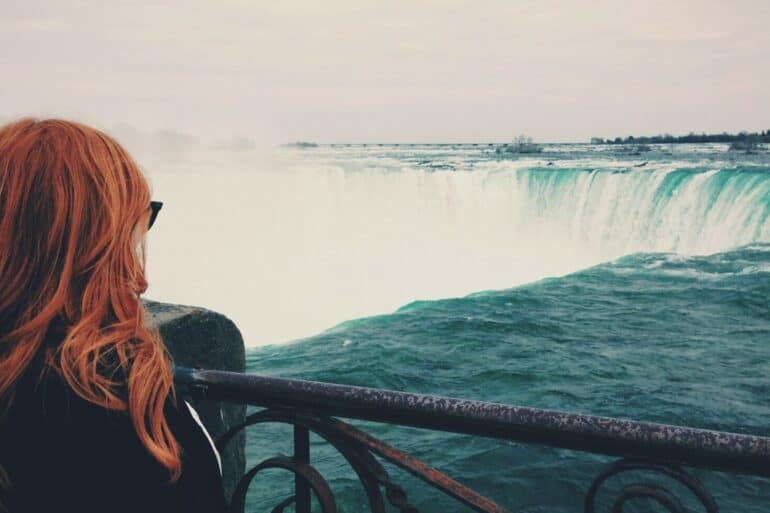 woman watching niagara falls