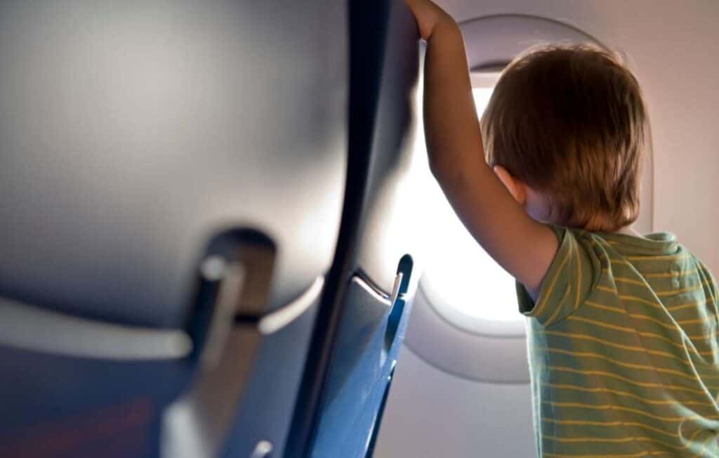 8 Tips to Help Kids Sleep When Traveling on Planes