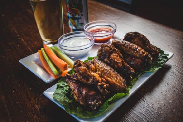 wings and sides on a table