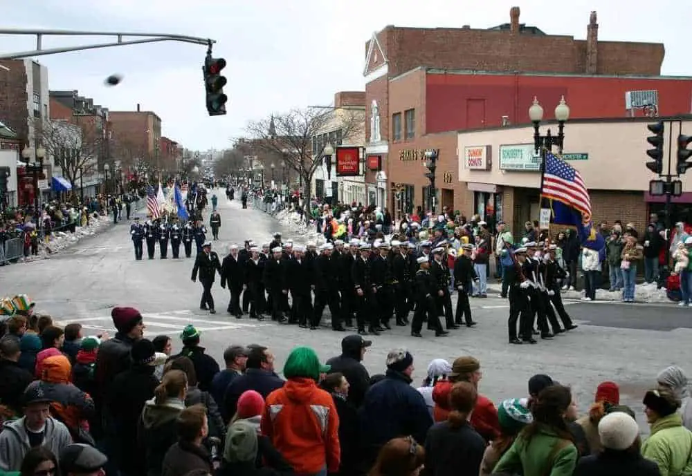 Cheering on sailors marching in st. Patrick's day parade in South Boston