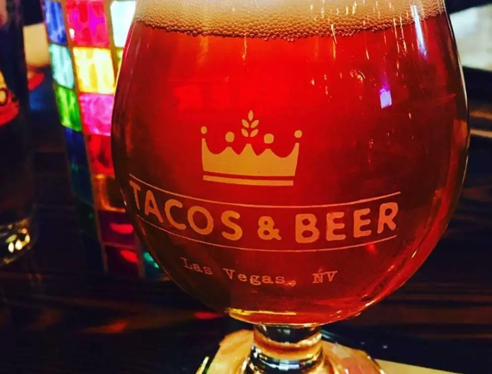 Cocktail with Tacos & Beer logo at Tacos & Beer in Las Vegas, Nevada.