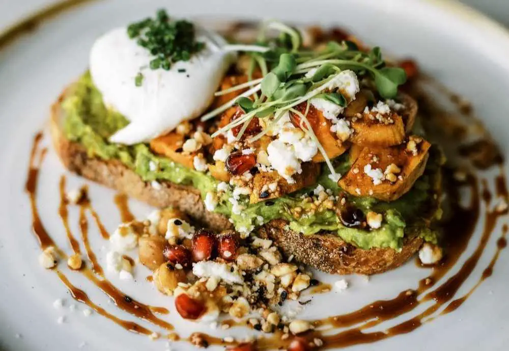 avacado toast at St. Kilda Cafe & Bakery, best breakfast spots in Des Moines, Iowa