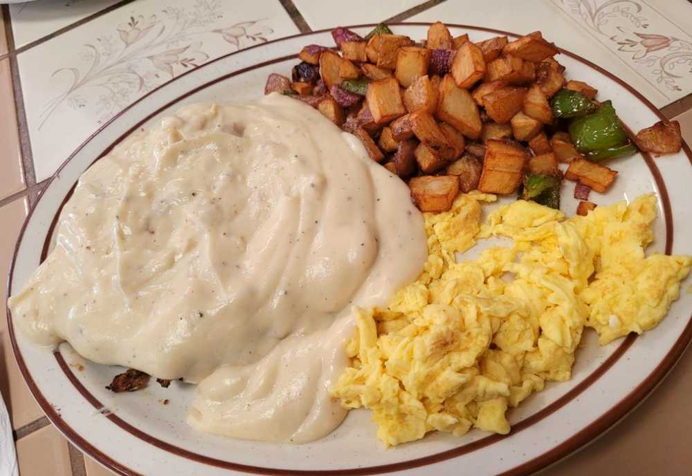 Country fried steak, scrambled eggs and country potatoes at Carla's Cafe in Bakersfield CA