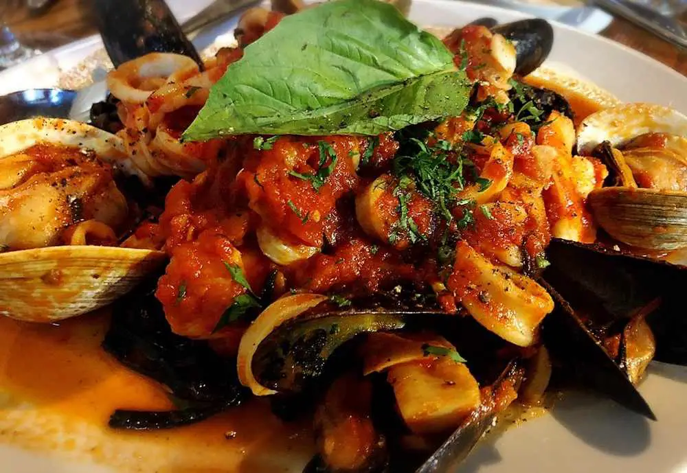 Squid Pasta with Tomato Sauce at Trattoria Trecolori in Manhattan, New York