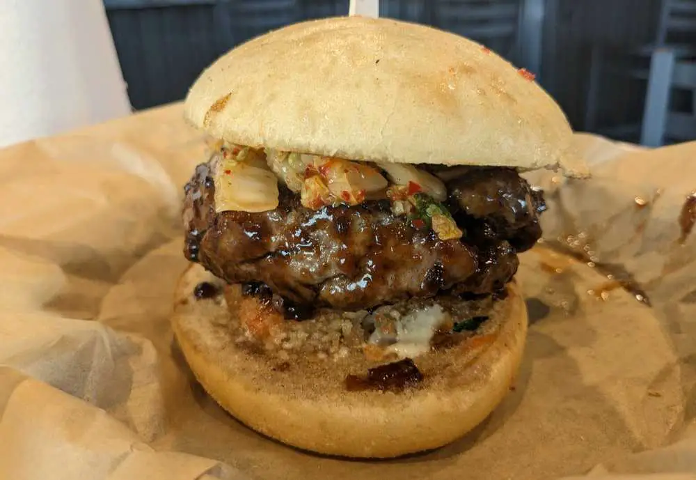 The popular Bulgogi Burger with kimchi at the Peppered Pig in Huntsville Alabama