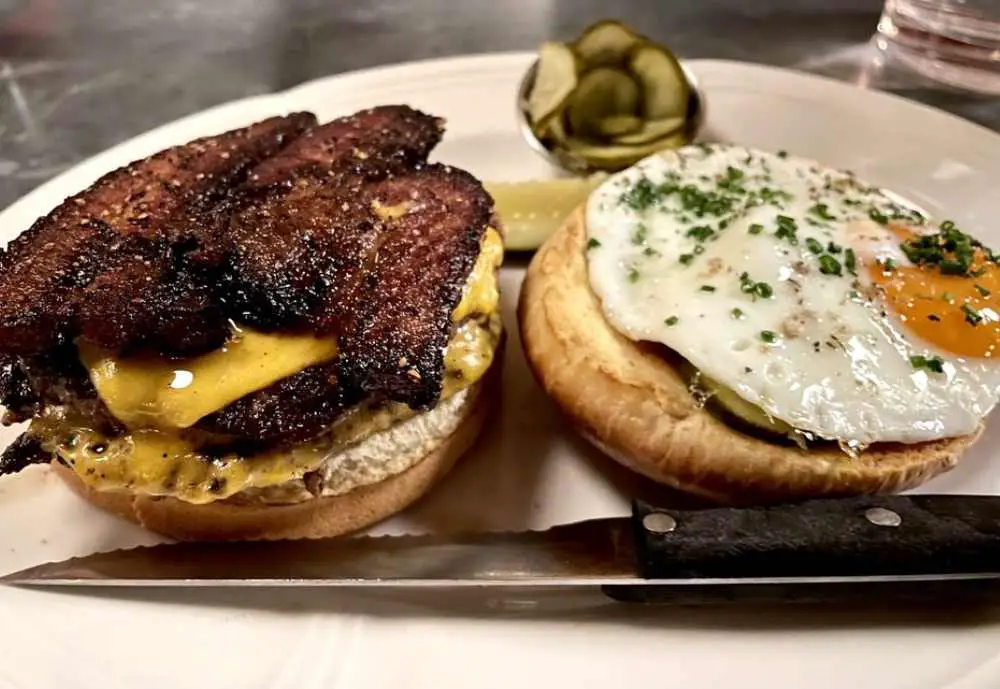 Single Cheeseburger with Thick - Cut Peppered Bacon at Au Cheval in Chicago, Illinois