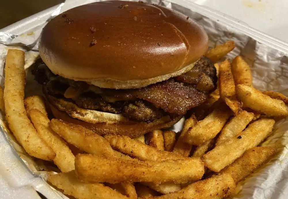 Smoke Burger with Seasoned Fries at Memphis Mojo Cafe in Memphis, TN