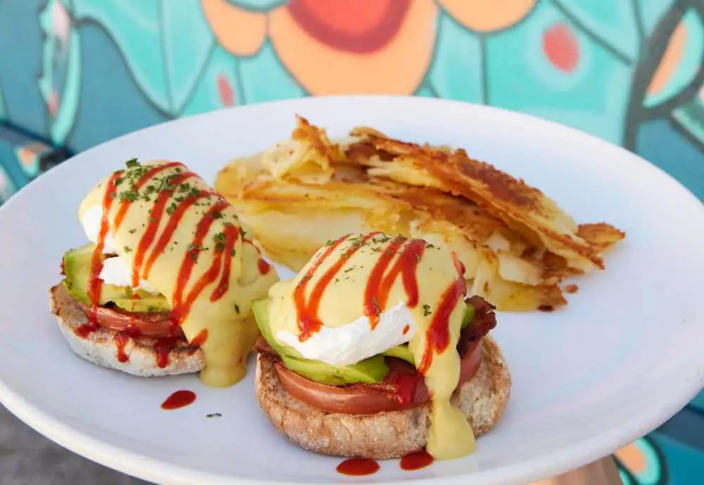 Eggs Benedict at Broken Yolk Cafe in Mesa, Arizona. One of the best breakfast spots in Mesa, AZ