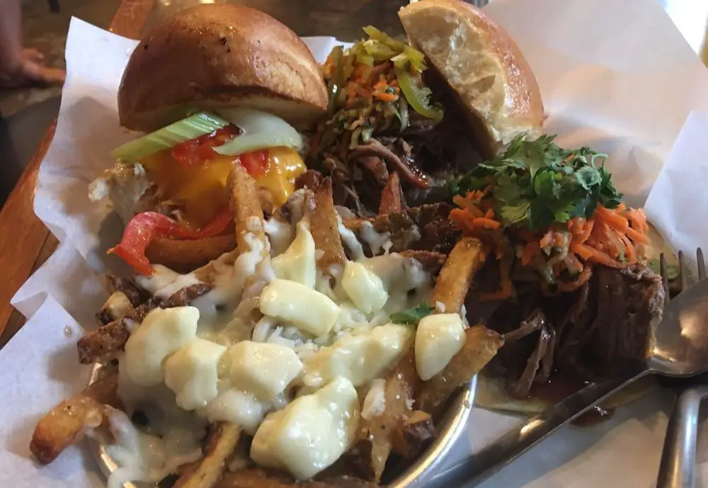 Buffalo Chicken Sammy, Bison Banh Mi Sammy and Bison Banh Mi Sammy on tortilla with poutine side, at the Colorado Room in Fort Collins Colorado