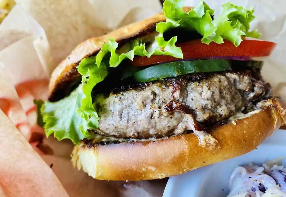 a huge burger at Kingfisher in Pensacola, Florida
