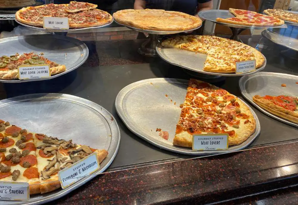 Various kinds of pizza on display at Luciano's in San Antonio, Texas
