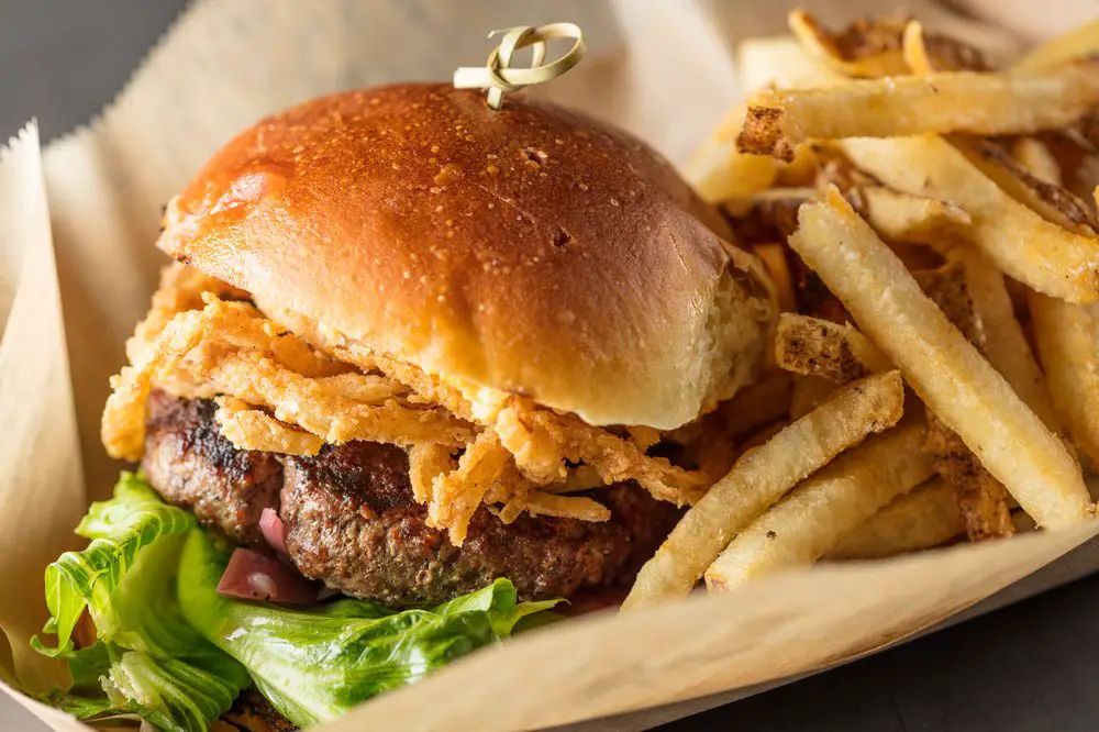 One of the best burgers in Cleveland, with Kentucky beer cheese, crispy and pickled onions and fresh romaine, all on a challah bun.