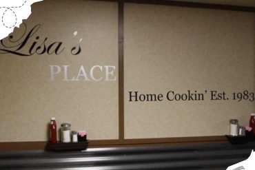 Freshly made home-cooked meals restaurant vintage interior with nostalgic atmosphere, established in 1983, featuring condiments on the table, perfect for travel and foodie adventures.