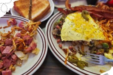 Beef hash with vegetables and eggs, toast on side, hearty American breakfast, comfort food, dining at a casual restaurant, delicious breakfast meal, Go To Destinations tourism food photo, travel dining experience in the US.