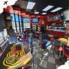 Bright fast-food restaurant interior with customers ordering and dining, featuring colorful branding, modern decor, large menu screens, and natural light from large windows, ideal for quick service dining experiences.