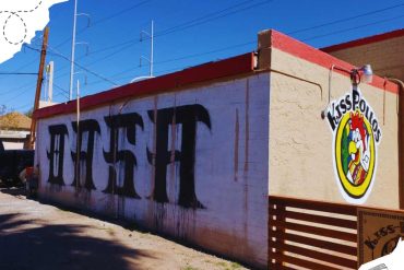 TASTE graffiti mural on building wall in Missoula, vibrant urban street art in Montana, showcasing local culture and artistic expression, perfect for travel enthusiasts seeking unique cityscapes.