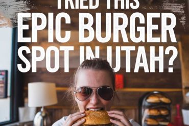 Delicious burger with fresh lettuce and sauce, enjoyed at a cozy restaurant in Utah. Perfect spot for burger lovers seeking an epic dining experience.