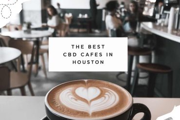 Steamy cup of coffee with latte art inside a cozy cafe setting, promoting the best CBD cafes in Houston for relaxing coffee experiences.