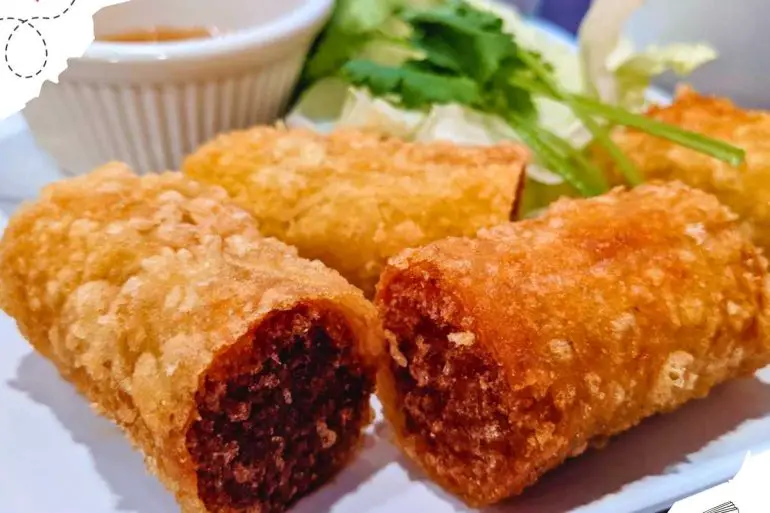 A plate of fried spring rolls.