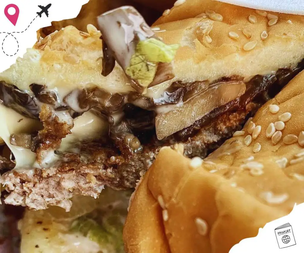 Close-up of a burger with mushrooms.