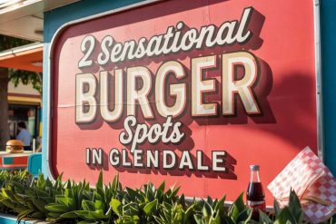 Colorful vintage burger stand sign in Glendale with fresh greenery, promoting popular burger spots in Glendale, perfect for food lovers and visitors seeking local dining experiences.