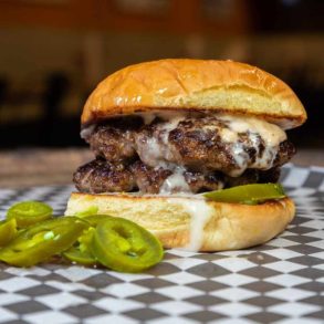 queso Blanco burger at whiskey foxtrot burger shoppe in Homewood alabama