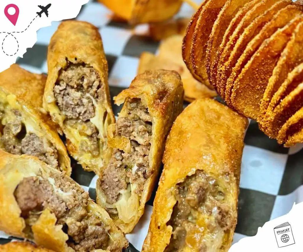 Savory beef and cheese spring rolls, crispy fried appetizer with minced beef filling, served with fried potato slices, delicious street food snack, popular in international cuisine.