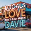 Vibrant exterior of a burger restaurant with colorful signage emphasizing "Locals Love This Burger Spot in Davie," attracting visitors seeking popular dining destinations and local food experiences.