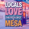 Colorful sign at a pizza restaurant highlighting local love and community vibe in Mesa.