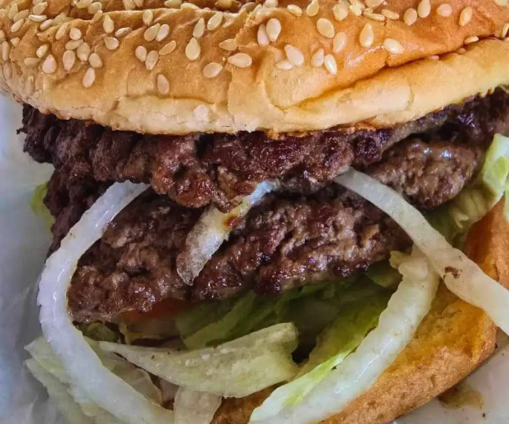 burger with onions at kings burger in San Jose california