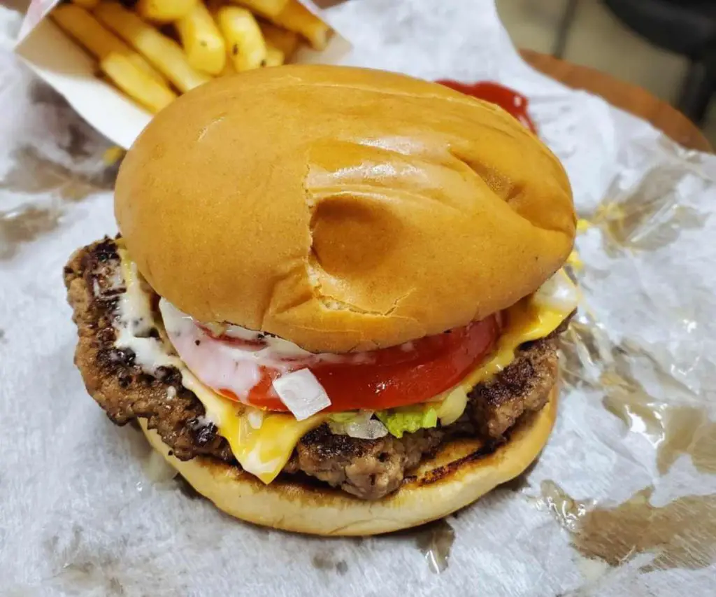 a juicy burger at Sheila c's burger barn in Auburn alabama